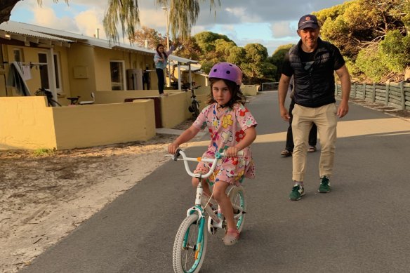 Brad Pettitt taught his daughter to ride without training wheels on Rottnest Island.
