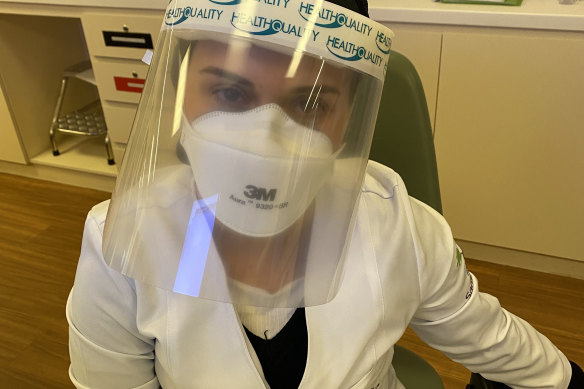 Dressed for battle: Nutritionist Fernanda Saccoletto works in a COVID-19 only private hospital in Sao Paulo, Brazil.