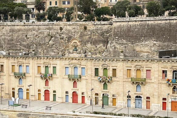 19th-century warehouses line the quay at Valletta, Malta.