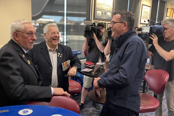 Premier Daniel Andrews speaking Noble Park RSL president John Meehan and vice president Ray McCarthy.