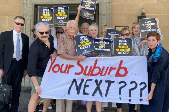Kangaroo Point residents - including spokesman Dr Ian Scott (left) outside City Hall - are questioning the influence of developers on Brisbane City Council’s neighbourhood planning process.