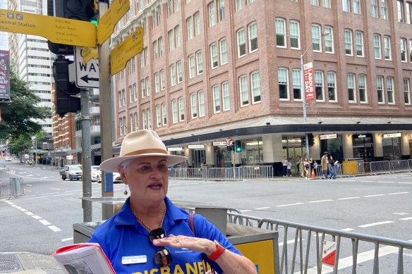 Sue Norman explains how the battle began on the intersection of Adelaide and Creek streets, where in 1942 luxury goods could be bought from the building over her shoulder.