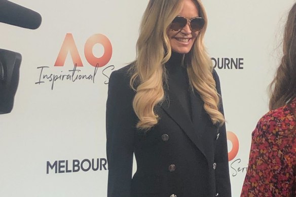 Sunglasses firmly in place, Elle Macpherson takes to the red carpet on Thursday.