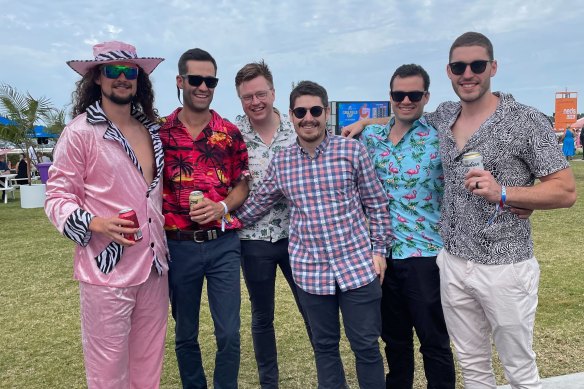 Groom Nathan Banks (left) and his mates enjoy his bucks day at the Caulfield Cup.