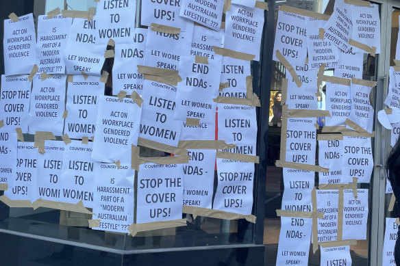 A Country Road store in Melbourne is plastered in posters after the retailer launched an internal investigation into alleged mishandling of staff complaints 
about bullying and harassment.