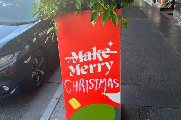 A vandalised Stonnington council ‘Make Merry’ sign.