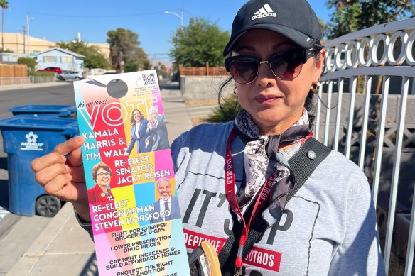 Maria Polanco, a hostess cashier at Rio Hotel & Casino, door-knocking in Las Vegas.