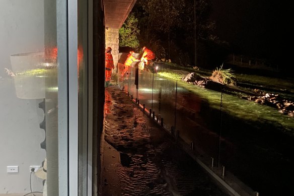 SES volunteers responded as Colin Scotts’ garage flooded.
