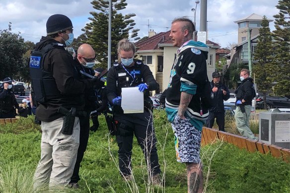 A man is arrested at St Kilda on Saturday.