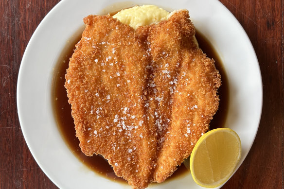 Chicken schnitzel with mash and jus is on the menu alongside other elevated pub classics.