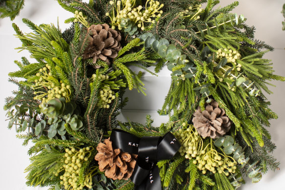 A predominantly green wreath from Kate Hill Flowers.