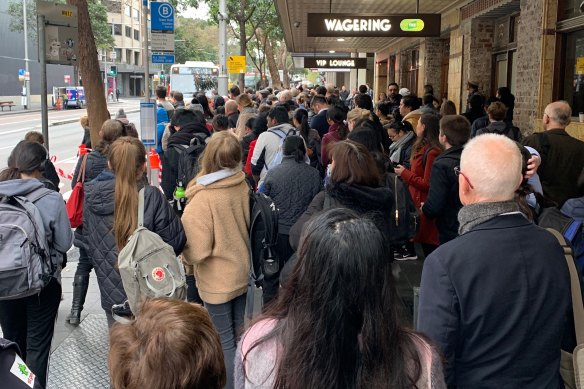 Commuters were directed by staff to take buses, leading to long queues.