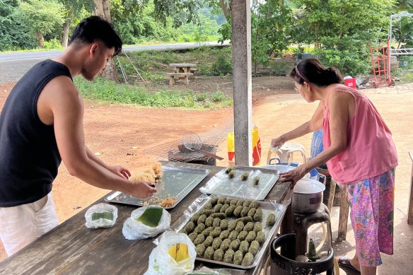 Yeen Veerasenee makes Thai desserts with his grandmother, Rojana, in Thailand.