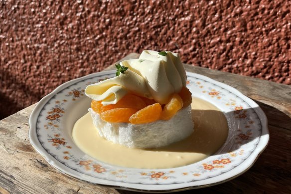 Soft-rolled meringue, mandarins poached with lemon myrtle and bay leaf custard.