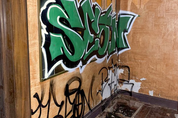 Damage and graffiti inside the Paragon.