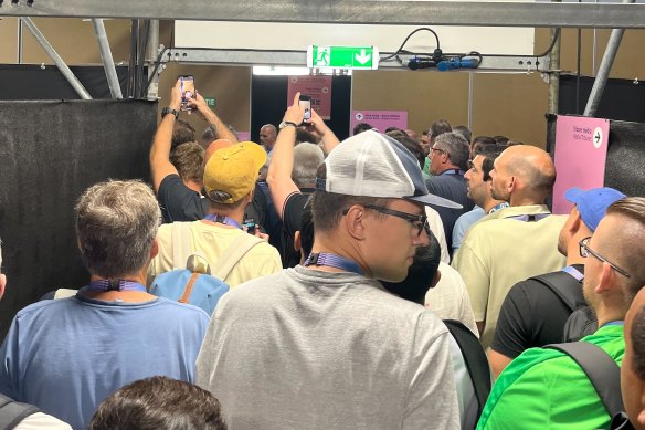 A stampede of reporters and photographers rushed to the mixed zone after Imane Khelif’s fight.