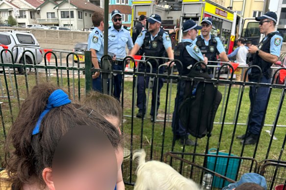 A photograph from Chanukah By The Sea in 2023 shows a larger number of NSW Police officers.