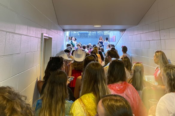 Swifties waiting to re-enter Accor Stadium.