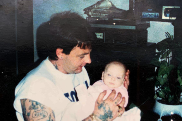 Dennis Allen with baby Jade.