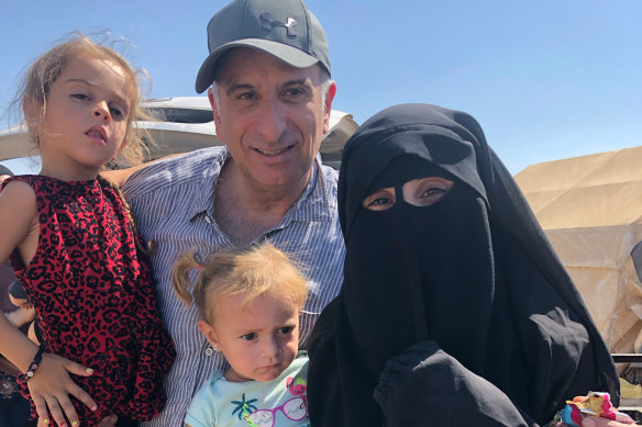 Kamalle Dabboussy visited his daughter Mariam and her daughters Aisha (left) and Fatema in al-Hawl camp in north-eastern Syria in 2019.