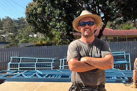 Self-employed Brisbane builder Austin Tarter works more than 50 hours a week.
