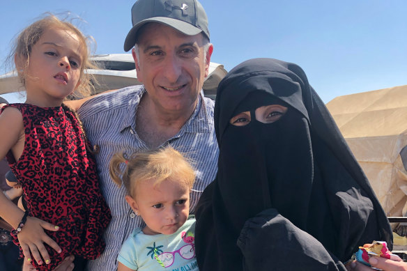 Sydney man Kamalle Dabboussy with his granddaughters and daughter Mariam, who were repatriated from a refugee camp in Syria last week. 