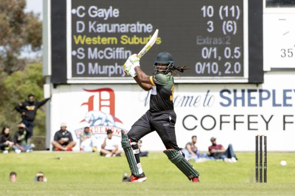 Former West Indian cricketer Chris Gayle belts a boundary during last weekend’s match in Dandenong.