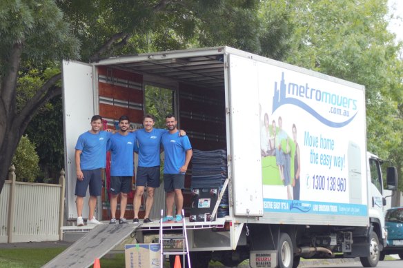 Metromovers chief executive Peter Borain (second from right) with  some of his staff before the pandemic.