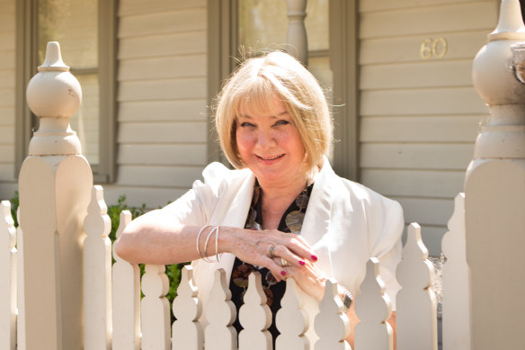 Gayle Roberts in front of her former home in Port Melbourne, which she sold before COVID-19 shut down Australia.