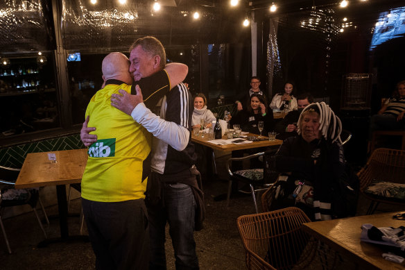 Commiserations after the grand final at the Elephant and Castle in Geelong.