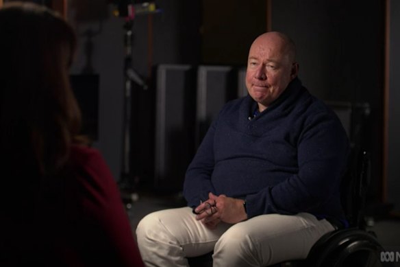 Seven producer Matthew McGrane is suing his employer after falling out of his wheelchair.