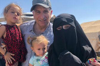 Kamalle Dabboussy with his daughter Mariam Dabboussy (right) and her daughters Aisha (left) and Fatema in al-Hawl camp in north-eastern Syria.
