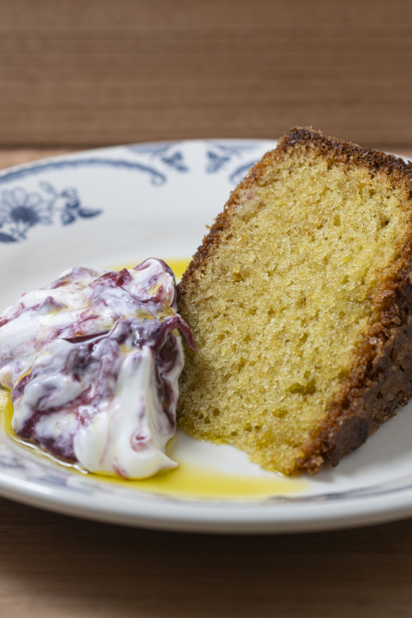 Olive oil cake with fruit-swirled yoghurt.