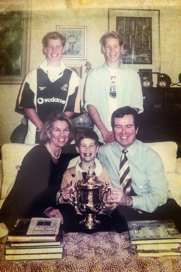O'Neill family  poses with the damaged Webb Ellis Cup on November 9 in Sydney.