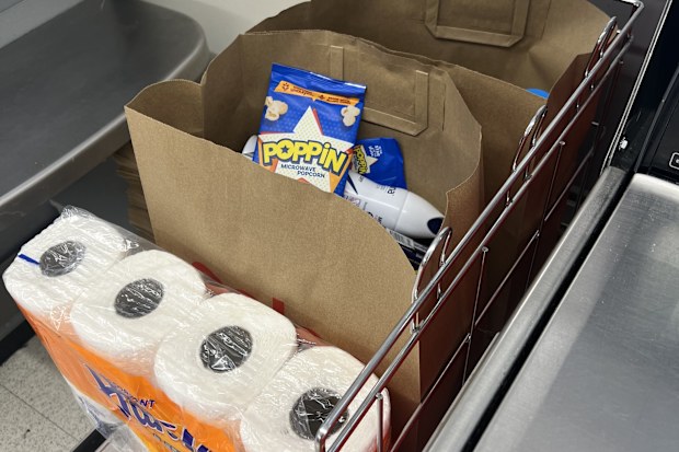 shopping bags at supermarket groceries coles woolworths aldi 