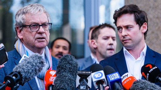Journalists Chris Masters and Nick McKenzie after the verdict.