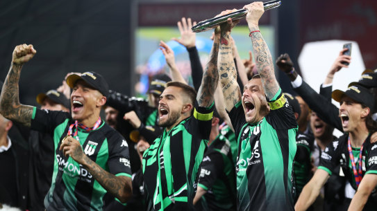Western United celebrate their A-League grand final triumph at AAMI Park last season - but Victorian sides will have to travel to Sydney next time.