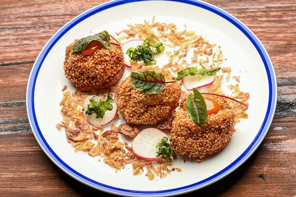 Prawn toast with lime mayo and crispy shallots.