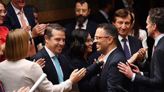 NSW Treasurer Daniel Mookhey received a tap on the back from Premier Chris Minns after delivering the budget.