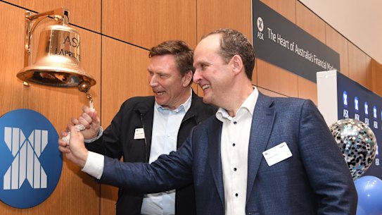 Tryo chairman David Thodey and chief executive Robbie Cooke ring the bell at the ASX on Friday in Sydney.