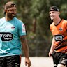 Tigers youngster Lachlan Galvin with Benji Marshall.