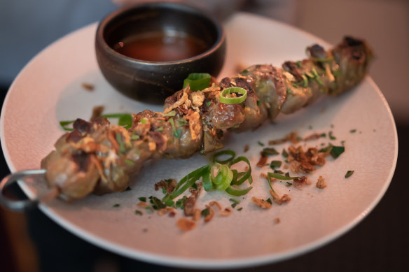 Lemongrass chicken skewer with coconut and tamarind. 