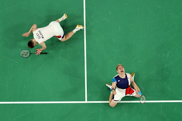 Aaron Chia and Wooi Yik Soh of Malaysia reacts after the men’s doubles badminton quarter-final match against India.