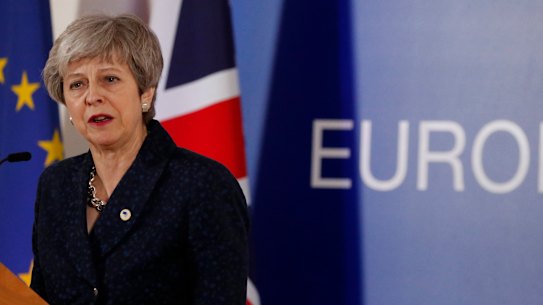 British Prime Minister Theresa May speaks during a media conference at an EU summit in Brussels.
