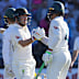 Josh Inglis, left, congratulated by Alex Carey after his half-century.