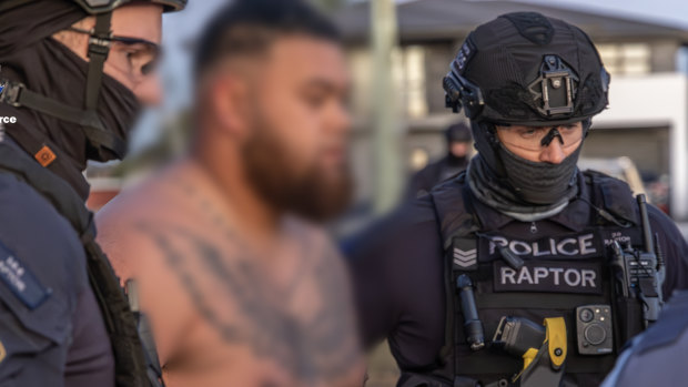 Man charged after police discover ‘appalling’ photo of toddler holding gun