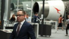 Alan  Joyce is working hard to convince state premiers to sign up to a national framework on borders.