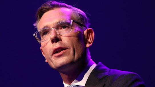 NSW Premier Dominic Perrottet speaks at the Sydney Summit at the ICC in Sydney on Monday.