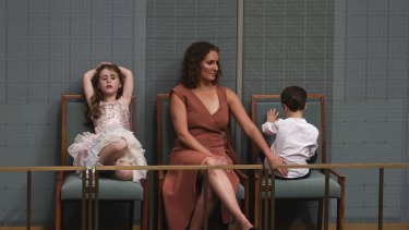 Josh Frydenberg’s children, Gemma and Blake, with mum Amie during the Budget speech in 2021.