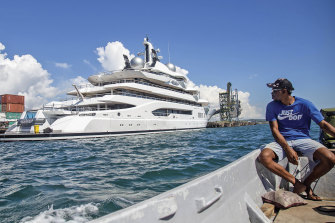 Boat captain Emosi Dawai looks at the superyacht Amadea where it is docked at the Queens Wharf in Lautoka, Fij.
